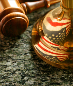An image of a gavel and Scales of justice that is the featured image of the practice areas at Munoz Law Firm